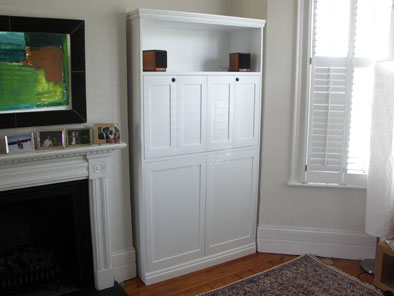 freestanding alcove TV unit with bi-fold doors
